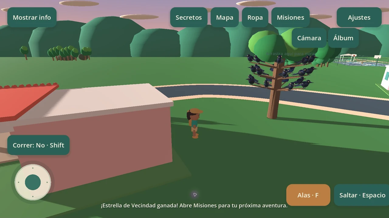 A game character near a tree full of changos beside a pastel house, with Spanish touch controls in Release 1.0.